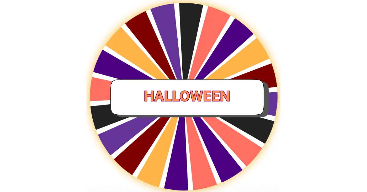 A colorful spinning wheel with orange, purple, black, yellow, and red sections. In the center, a white rectangle displays the word HALOWEEN in bold orange letters.